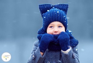 50082841 - cute little boy, kid in winter clothes walking under the snow