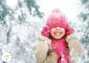 48769923 - happy child girl playing on a winter walk in nature