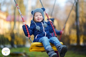 41806881 - adorable girl having fun on a swing on beautiful autumn day