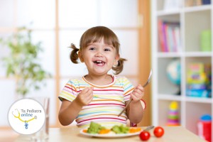 54270212 - happy kid girl eating vegetables. healthy nutrition for children