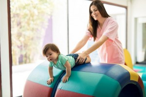 Baby working out in a therapy center