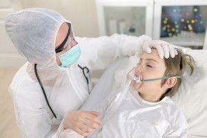 Doctor Intubating a Kid Having a Respiratory Desease